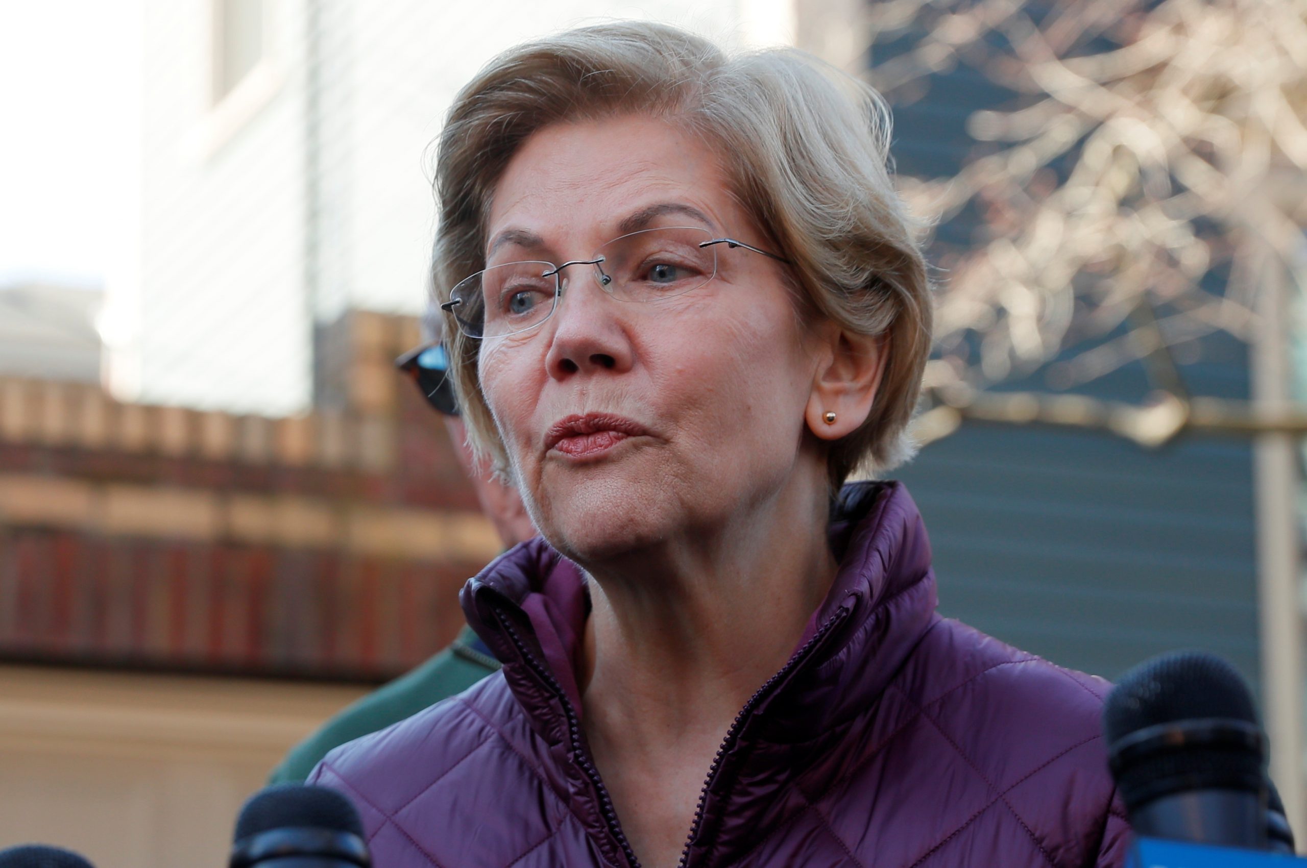 Warren Calls for Firing or Resignation of Postmaster General