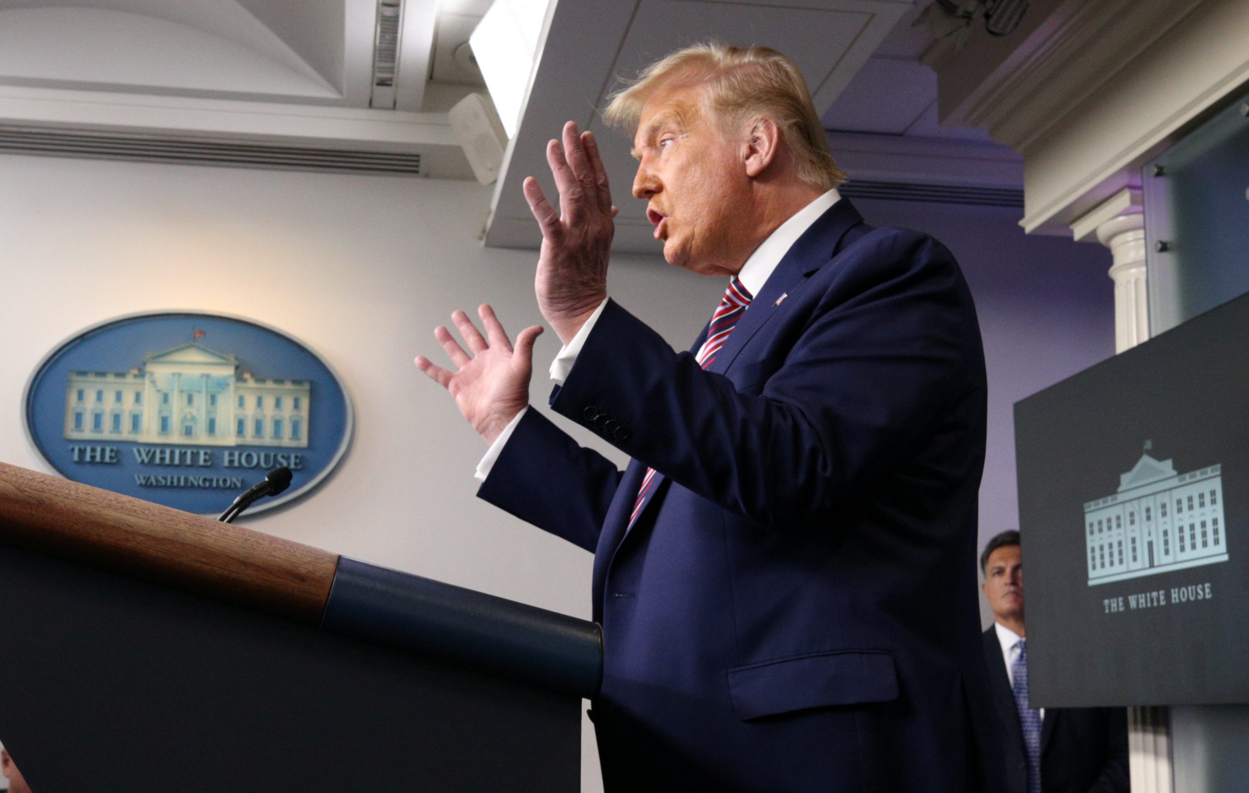 Trump Says He Paid Millions in Taxes, Plays Down Concerns About Debt