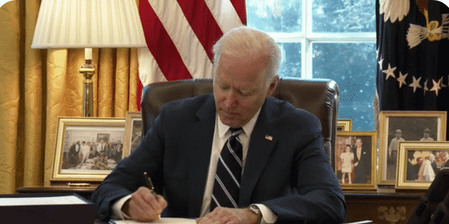 Biden Signs $1.9 Trillion COVID Relief Bill, His First Legislative Win