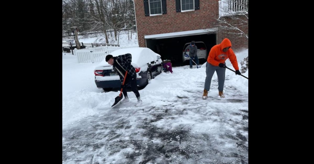 High School Football Team Participates in Unusual 'Workout': Shoveling Snow for the Elderly