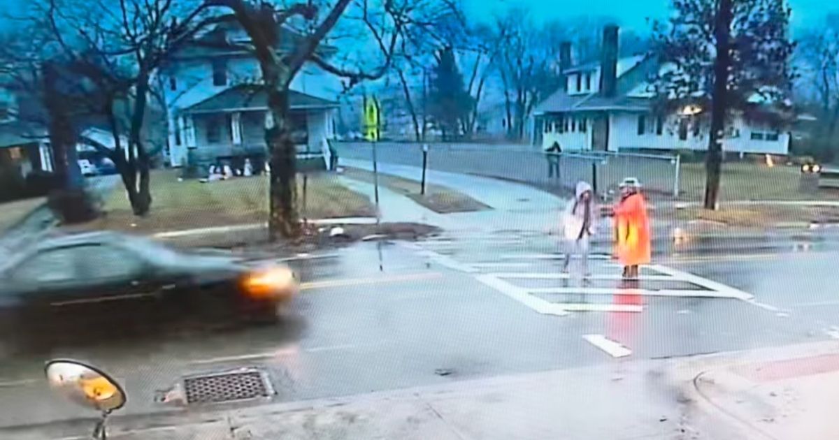 Crossing Guard Gets Hit Pushing Girl out of Harm's Way as Car Heads Straight for Them