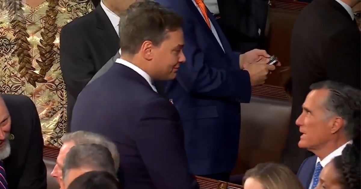 Cameras Catch Mitt Romney in Heated Dispute with Fellow Republican Just Before SOTU