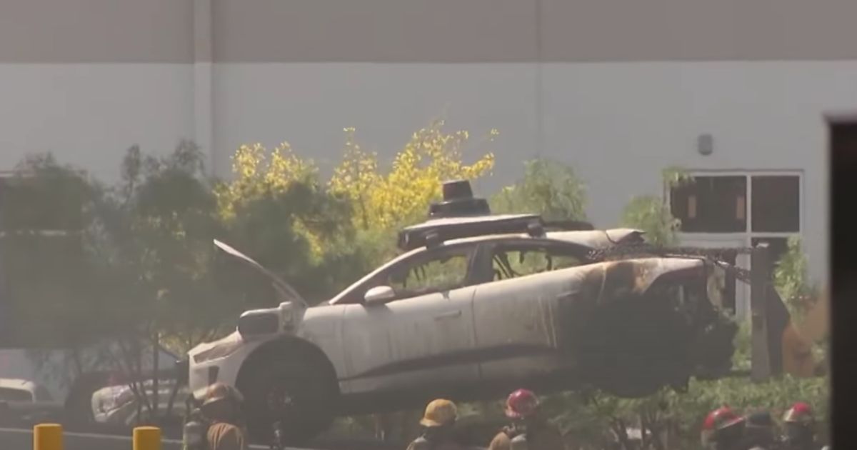Self-Driving EV Catches on Fire, May Take Weeks to Put Out – Look What Firefighters Had to Put It In