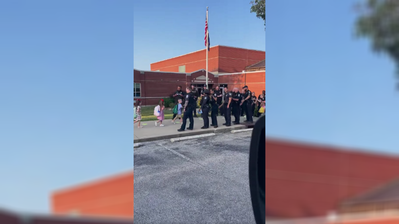 Kindergartner Gets Special Police Welcome on First Day of School After His Father Died in the Line of Duty