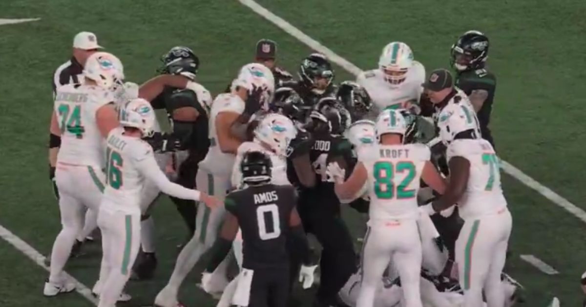 NFL Ref Bloodied After On-Field Brawl, Players Ejected from Game