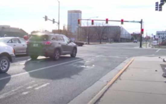 Woman Arrested After Driving Through Religious Group of People