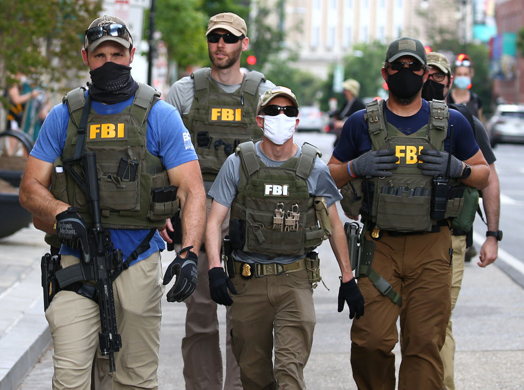 Fired FBI Agents Say Kneeling Was Tactical, Not Political, Sue to Get Jobs Back