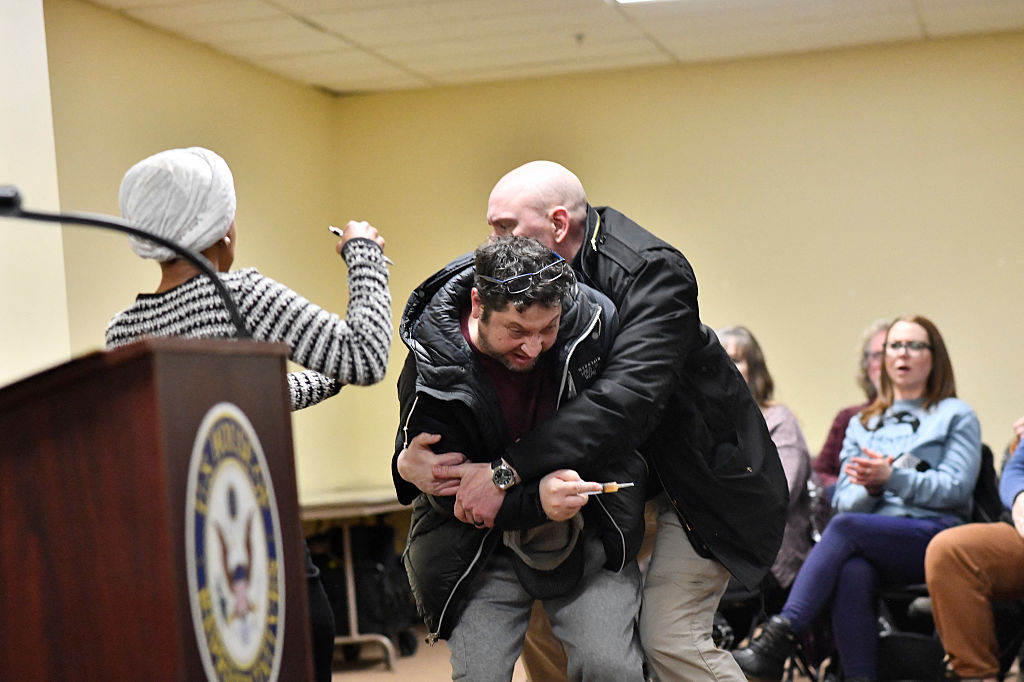 Man Sprays Ilhan Omar With Unknown Substance During Town Hall