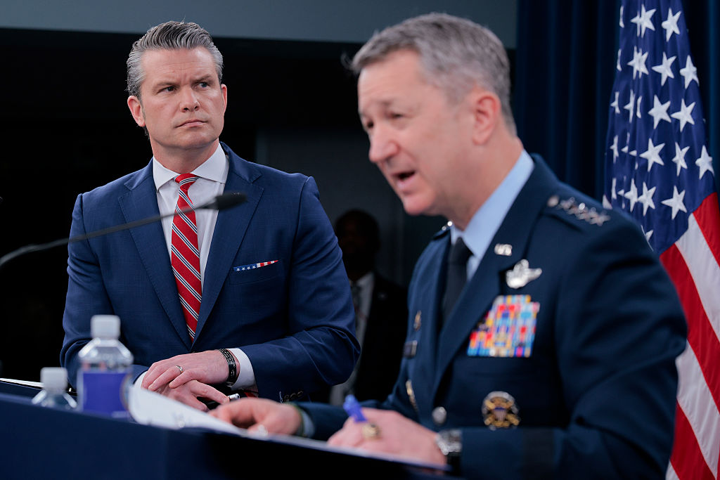 Hegseth, Caine Talk ‘Kamikaze Dolphins’ in Media Briefing